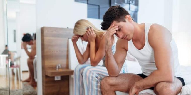 Couple having intimacy problems in the bedroom